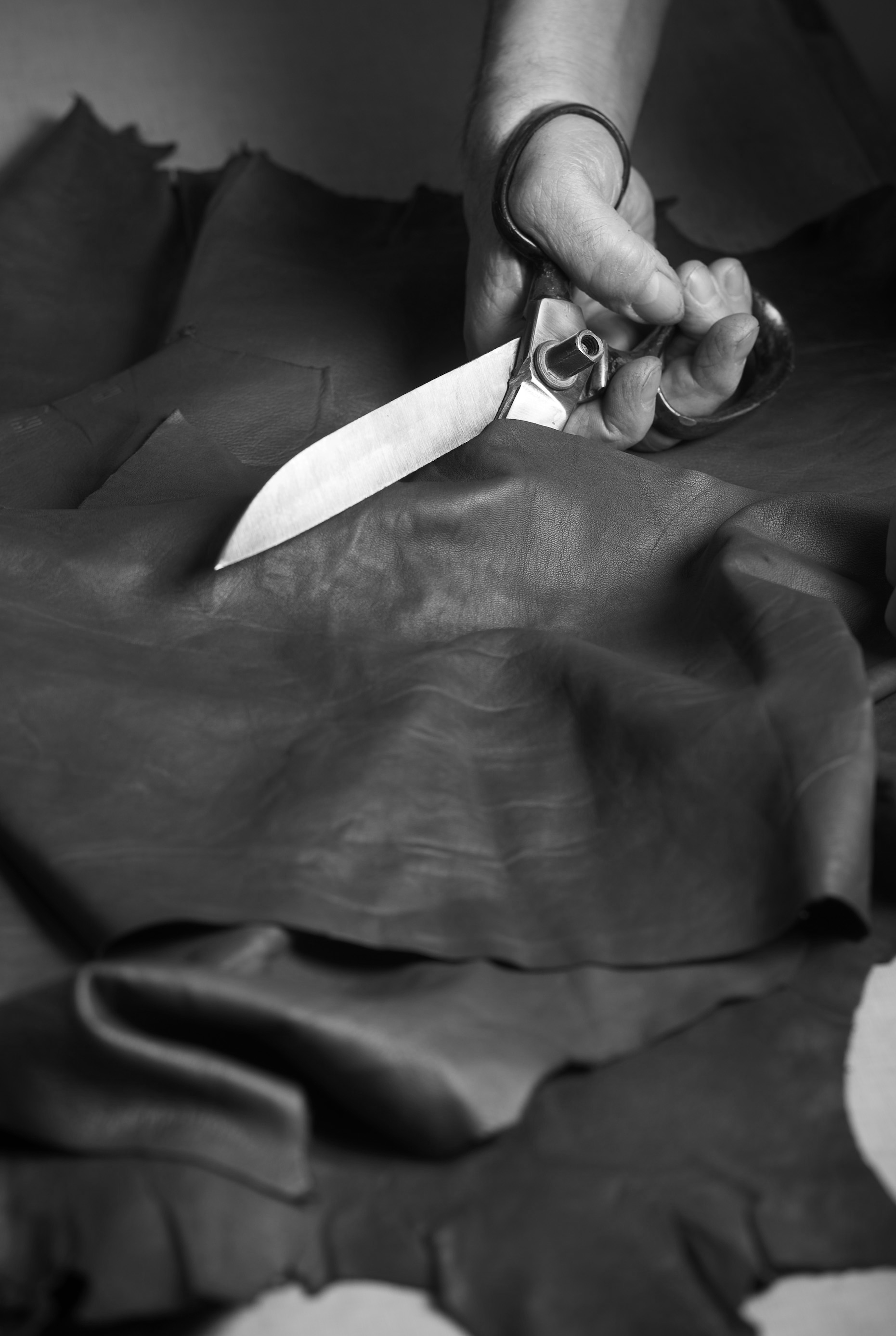 Artisan cutting premium leather